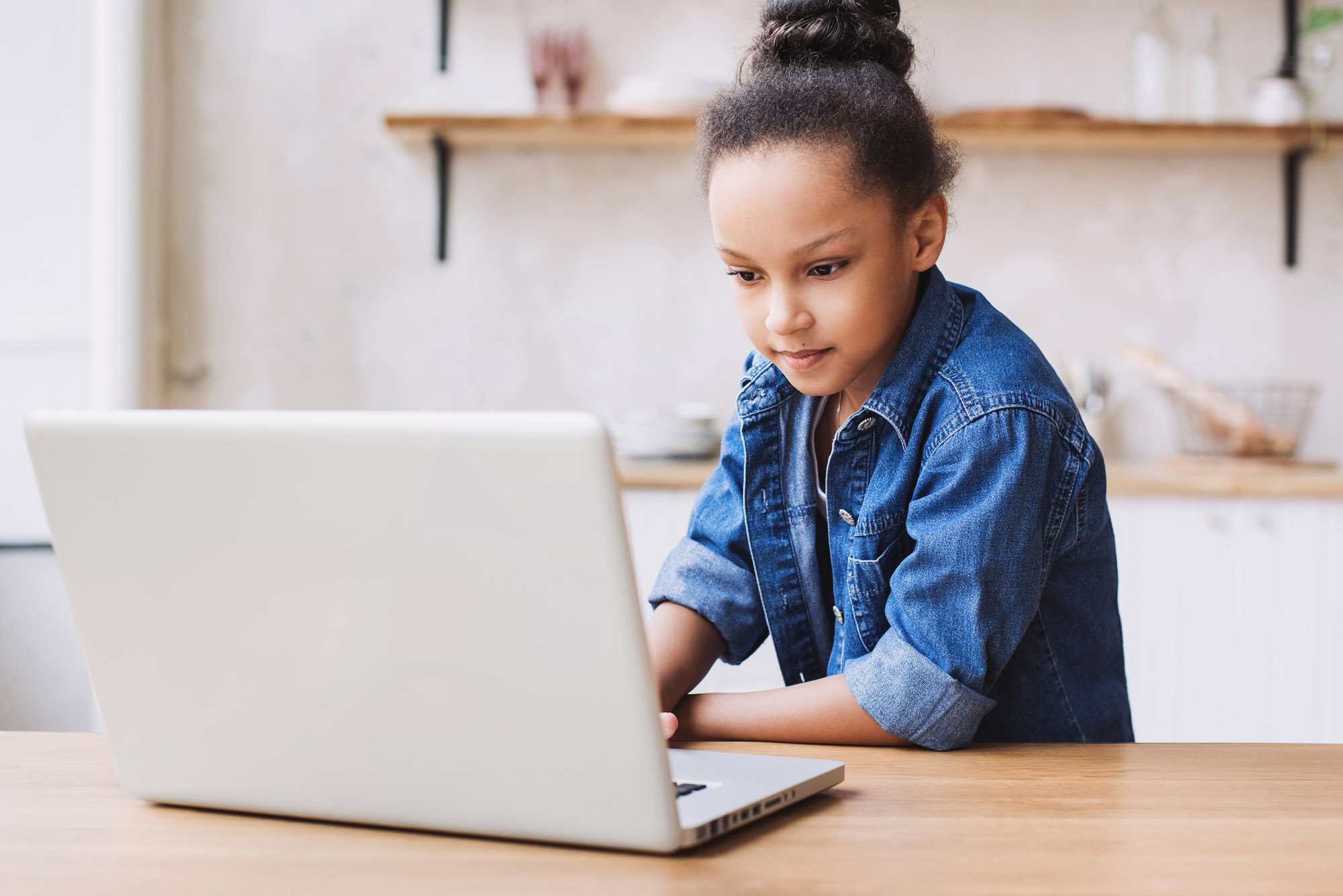 Young girl on laptop