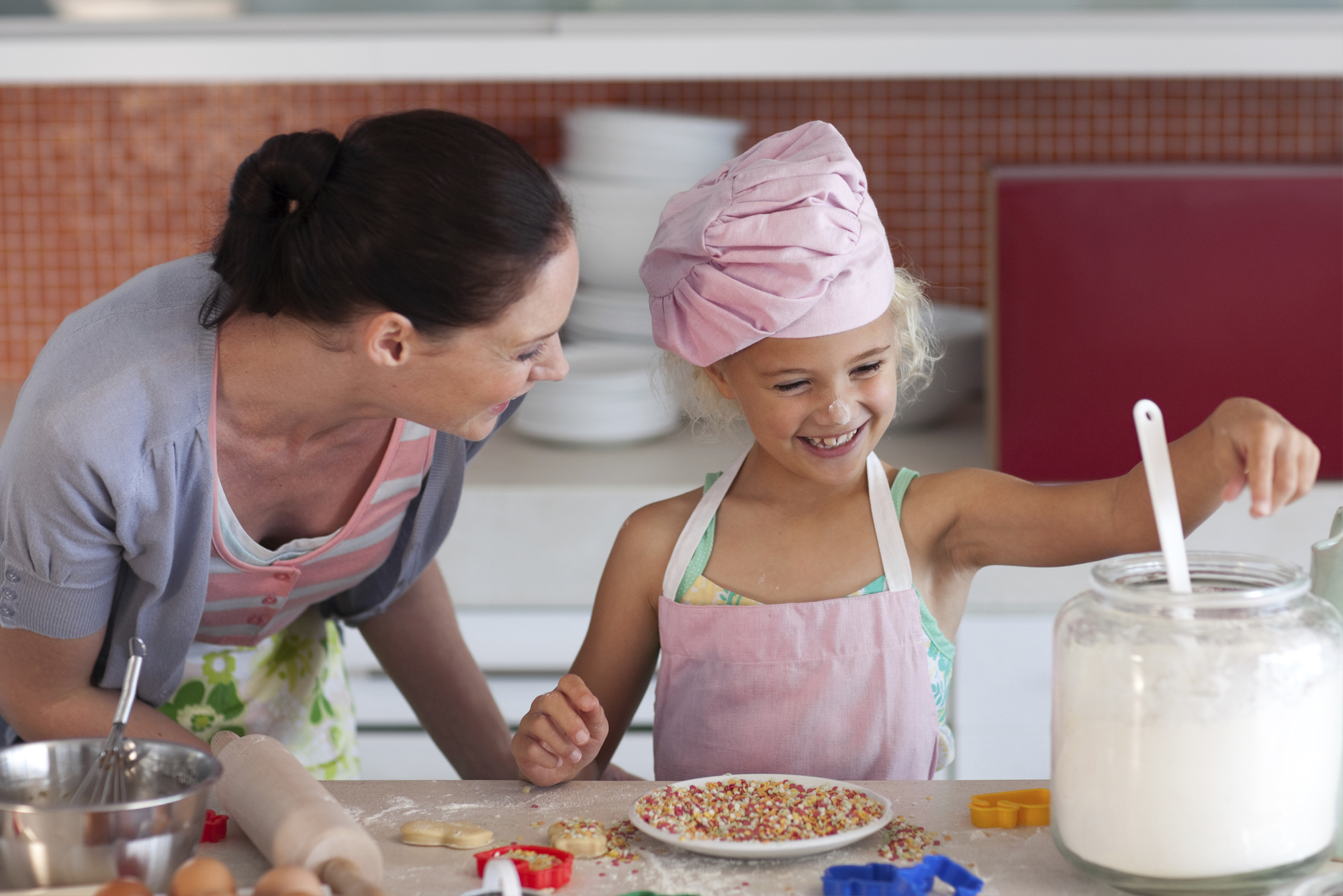 Mom and daughter baking